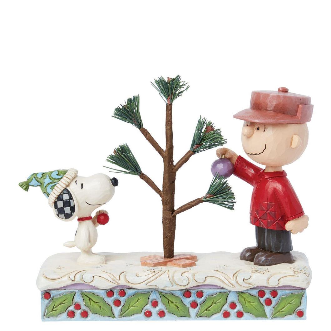 Snoopy and Charlie Brown with the Iconic Christmas Tree